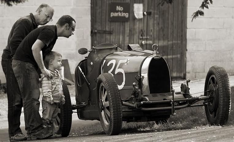 The classic cars on view at Prescott attract the admiration of all generations of motor racing fans.